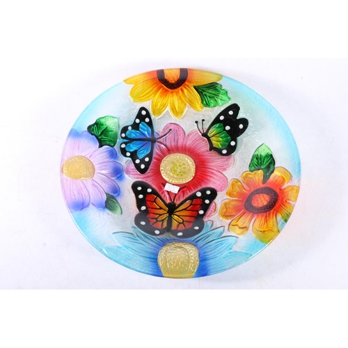 112 - Glass charger decorated in colourful butterflies and flowers design, 36cm diameter.