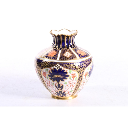 62 - Royal Crown Derby #1128 small bulbous vase, 12.5cm high.