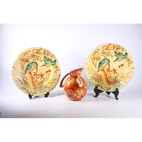 64 - Pair of Maling 1920s plates decorated with kingfishers and a Sylvac jug.