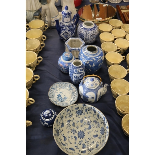 78 - Chinese blue and white pottery and porcelain to include small ginger jars, small teapots, a bowl, et... 