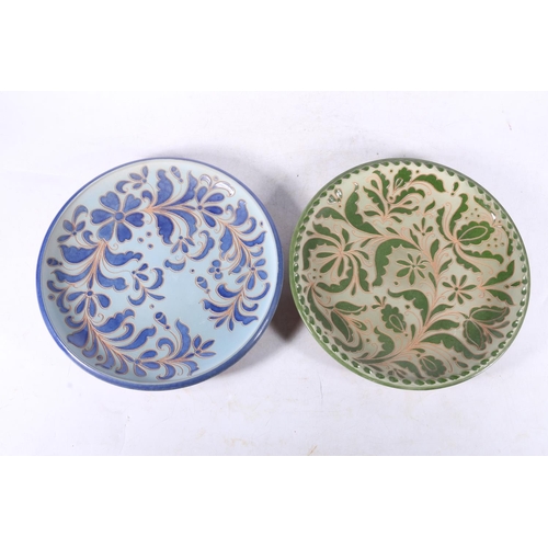 82 - Pair of continental sgraffito decorated plates, 28cm diameter.