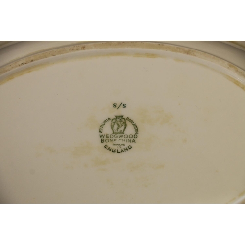 83 - Wedgwood Ice Rose part dinner service comprising plates, bowls, tureens, vase, soup coupes and stand... 