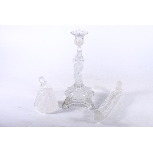 116 - French pressed glass candlestick in the form of Jesus, another pressed glass figure, and a small pre... 