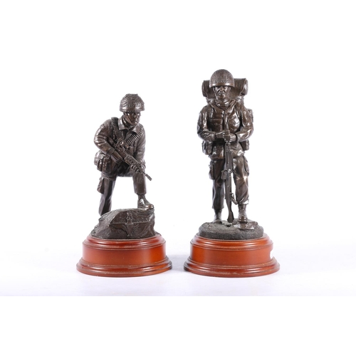 123 - Two paratrooper bronzed figures in full field kit, one carrying GPMG, the other with SA80, max H32cm