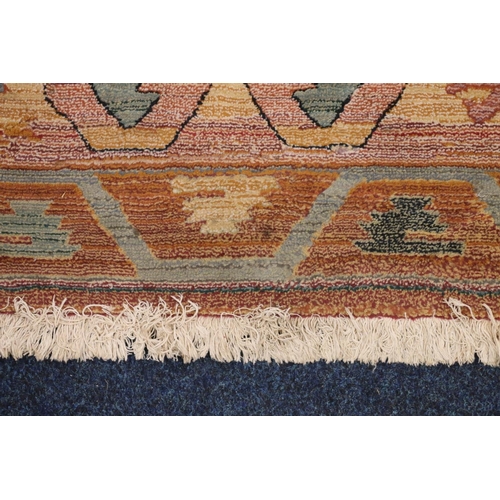 387 - Oriental Olefin pile rug, 120cm x 180cm.