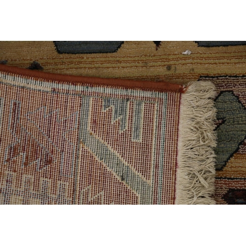 387 - Oriental Olefin pile rug, 120cm x 180cm.