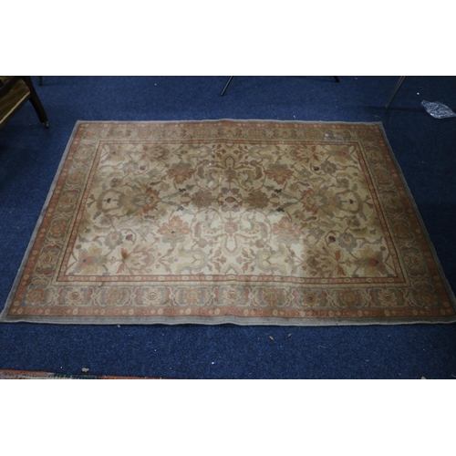 388 - Oriental wool pile rug, 187cm x 133cm.