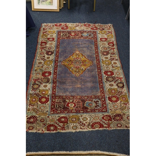 392 - Turkish prayer rug with geometric borders and central geometric design, 155cm x 106cm.