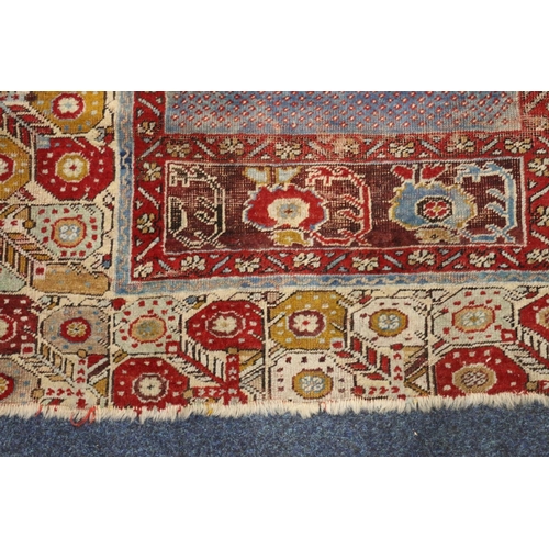 392 - Turkish prayer rug with geometric borders and central geometric design, 155cm x 106cm.