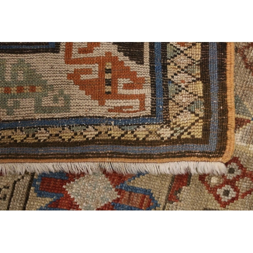 393 - Caucasian Kelim style beige ground rug, 257cm x 117cm.