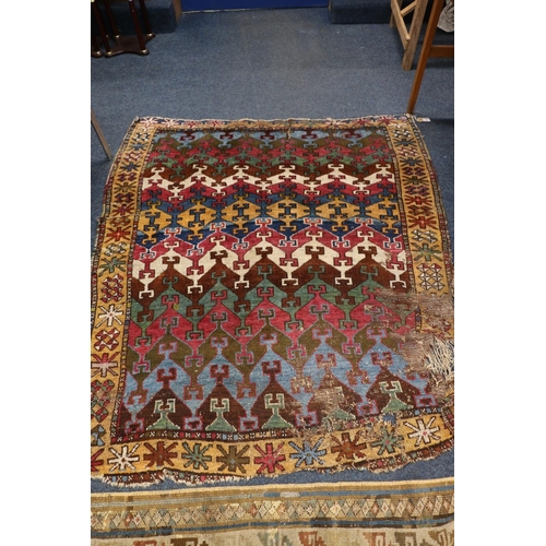 394 - Caucasian geometric design rug with polychrome colouring, 166cm x 141cm.