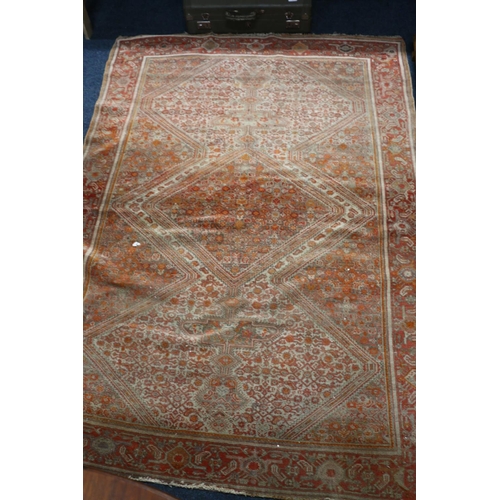 395 - Persian rust red rug, 10cm x 135cm.