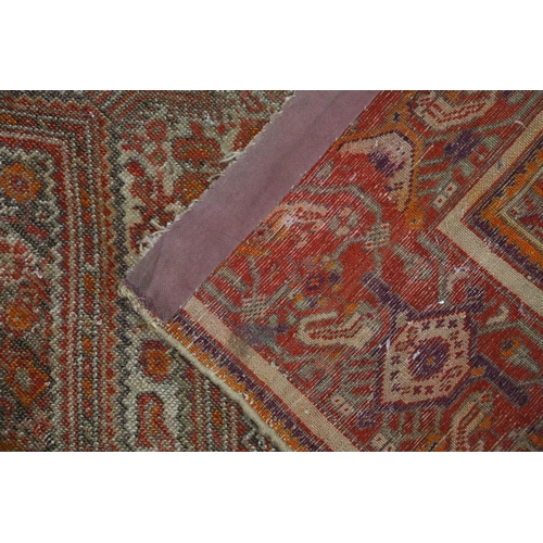 395 - Persian rust red rug, 10cm x 135cm.