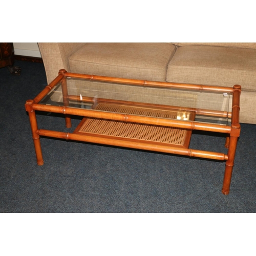 629 - G-Plan faux bamboo and bergere glass top coffee table.