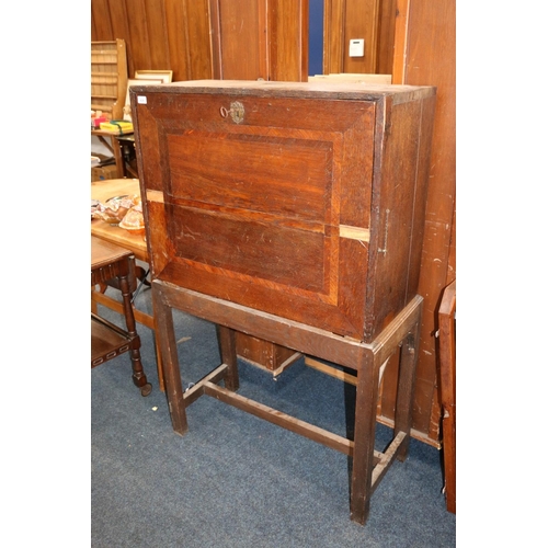 639 - Antique oak campaign cabinet on stand, the fall front with fully fitted interior including drawers, ... 