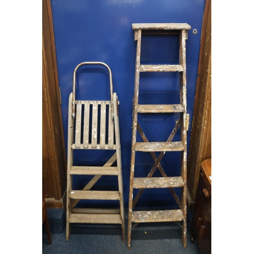 663 - Two pairs of painters step ladders.