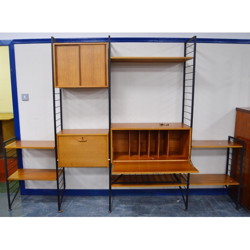 477 - Mid-20th century Ladderax modular shelving unit, comprising teak-veneered cupboards and open shelvin... 