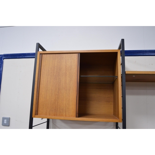 477 - Mid-20th century Ladderax modular shelving unit, comprising teak-veneered cupboards and open shelvin... 