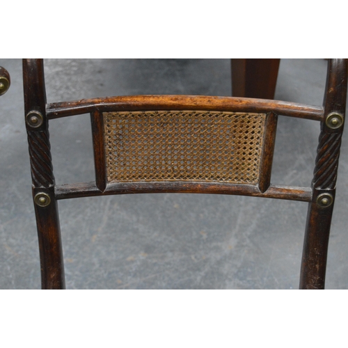 479 - Pair of Regency mahogany dining chairs, each with cane work to the back rest and seat, gilt metal ro... 