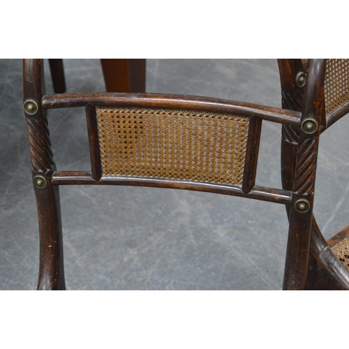 479 - Pair of Regency mahogany dining chairs, each with cane work to the back rest and seat, gilt metal ro... 