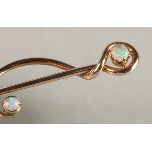 87 - Murrle Bennet 9ct gold pin set with two opals, 1.5 grams.