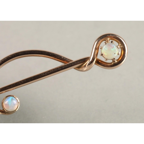 87 - Murrle Bennet 9ct gold pin set with two opals, 1.5 grams.