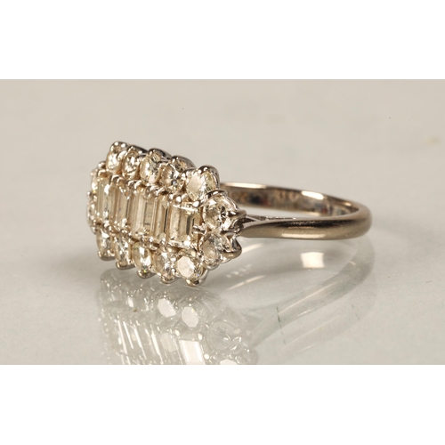 70 - Ladies 18ct white gold diamond cluster ring, central row of five baguette cut diamonds surrounded by... 