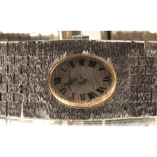 117 - Bueche-Girod ladies 9ct white gold wrist watch, silvered dial with roman numeral hour markers, on a ... 