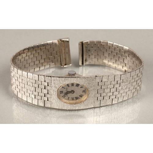 117 - Bueche-Girod ladies 9ct white gold wrist watch, silvered dial with roman numeral hour markers, on a ... 