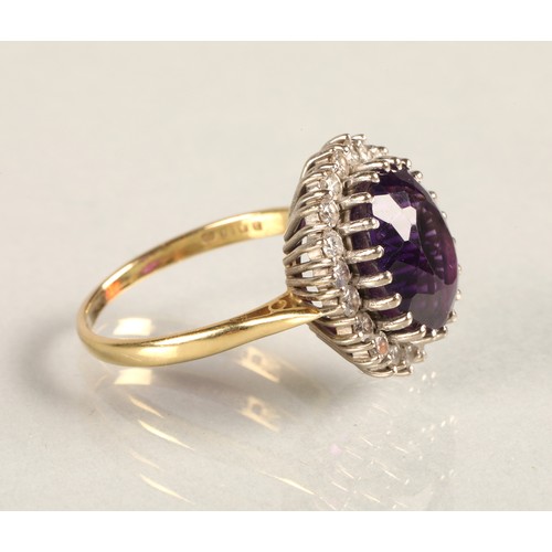 68 - Ladies 18ct yellow gold amethyst & diamond ring, central amethyst surrounded by twenty small dia... 