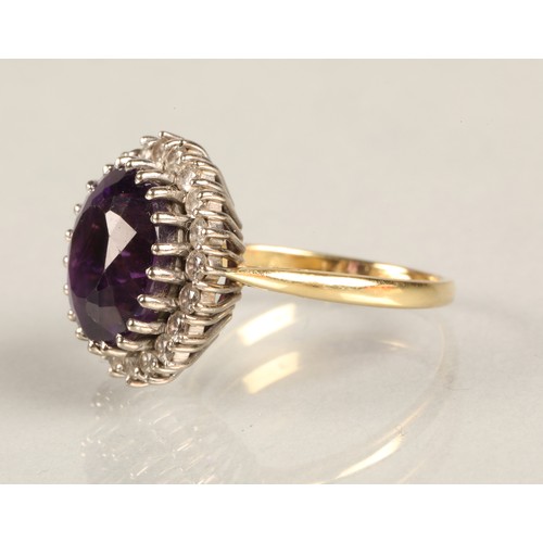 68 - Ladies 18ct yellow gold amethyst & diamond ring, central amethyst surrounded by twenty small dia... 