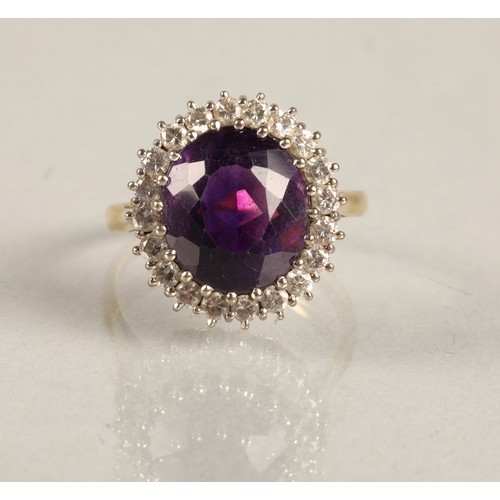 68 - Ladies 18ct yellow gold amethyst & diamond ring, central amethyst surrounded by twenty small dia... 