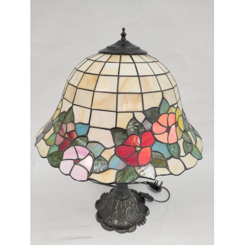 446 - Tiffany style stained glass table lamp with floral motif shade on moulded base. Height 63cm Shade di... 