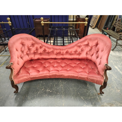 518 - Victorian mahogany scroll end sofa, upholstered in later pink button back velour, with scroll arm re... 