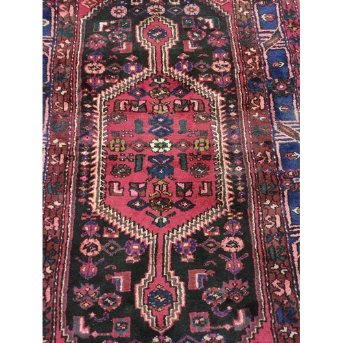 432 - Persian Hamadan hand knotted rug, with large geometric medallion to the centre, further geometric mo... 