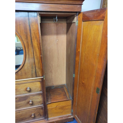 504 - Victorian mahogany wardrobe with moulded cornice above door with mirrored panel above three drawers,... 