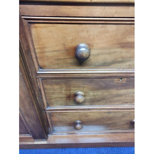 504 - Victorian mahogany wardrobe with moulded cornice above door with mirrored panel above three drawers,... 