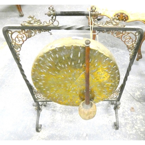 237 - Antique brass and wrought iron dinner gong with beater.