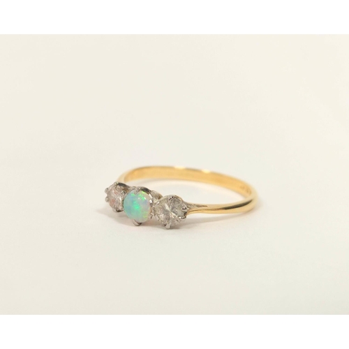 169 - Diamond and opal three stone ring, 2.1g. '18ct platinum 1930's, size 'R'.