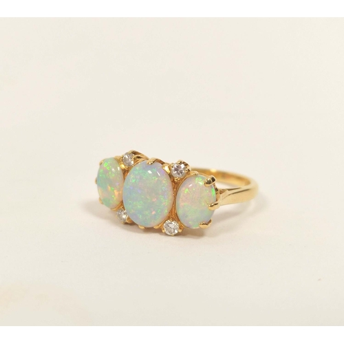 170 - Opal and diamond ring with oval opals approx. 7 and 8mm in 18ct. gold by Cropp & Farr, size 'K1/... 