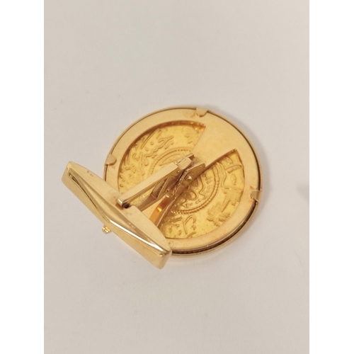 177 - Pair of gold cufflinks, each with Saudi gold coin '22kt', 18ct.gold swivel backs.27g.