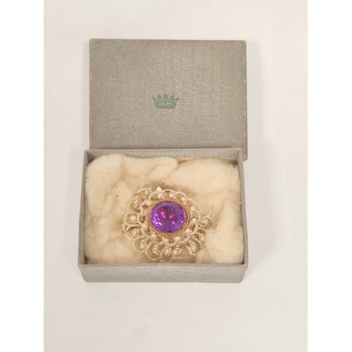 181 - Early 19th century seed pearl brooch with foiled amethyst in gold, upon mother of pearl.