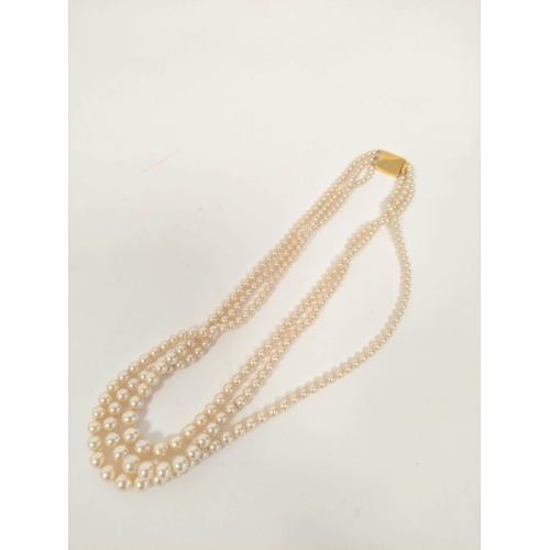 182 - Three row necklace of graduated simulated pearls on 9ct gold Ciro rectangular snap.