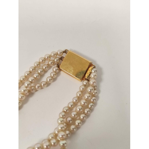 182 - Three row necklace of graduated simulated pearls on 9ct gold Ciro rectangular snap.