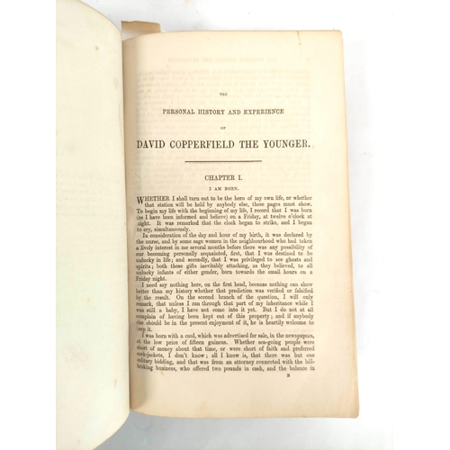 52 - DICKENS CHARLES.  David Copperfield. Two 1st eds. in book form with the appropriate mispri... 