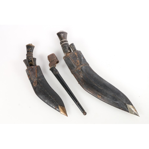 1532 - Two Gurkha kukri knives with leather sheaths and a British No4 mk5 spike bayonet with scabbard. (3)