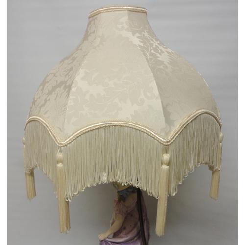 222 - Continental bisque table lamp, c. early 20th century, modelled as a classical maiden in dress, paint... 