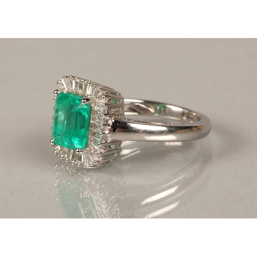 76 - 18ct white gold diamond and emerald ring, Size M