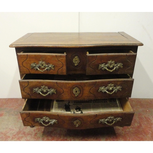 404 - Antique French provincial oak serpentine chest of two short and two long drawers, iron locks to the ... 