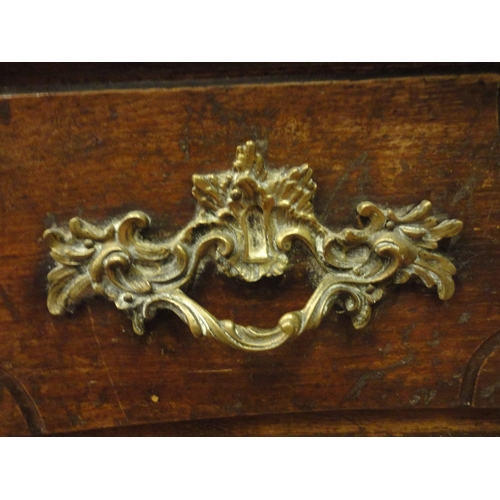 404 - Antique French provincial oak serpentine chest of two short and two long drawers, iron locks to the ... 